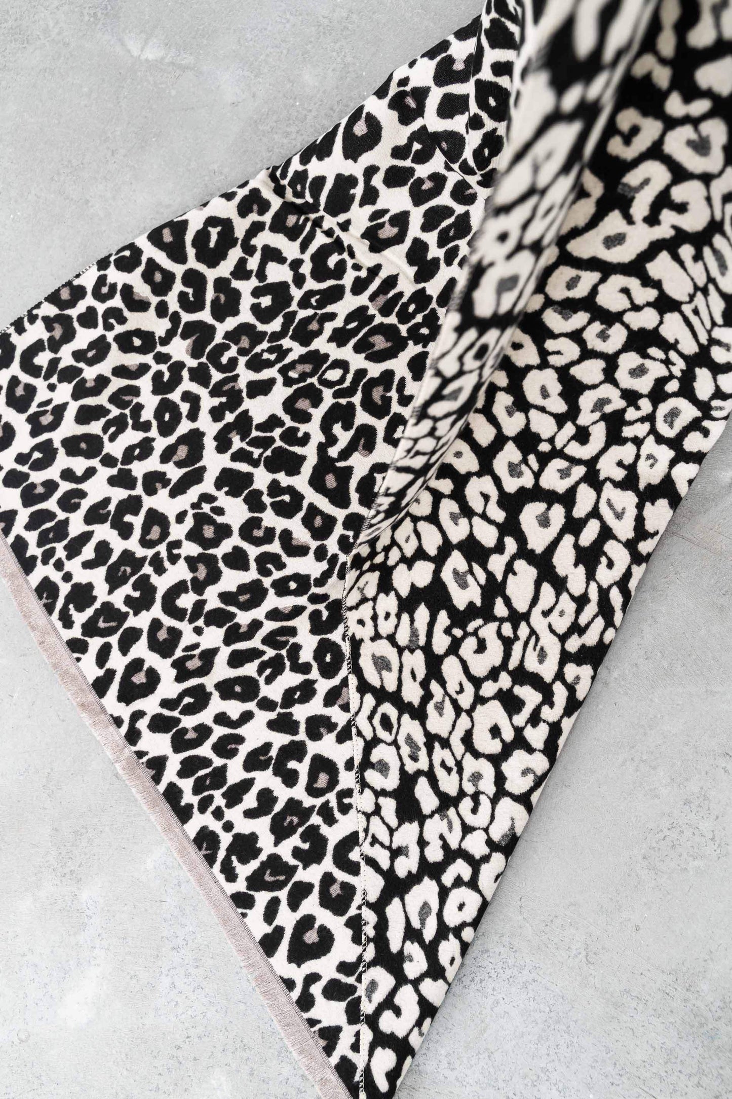 ESTOLA REVERSIBLE ANIMAL NEGRO