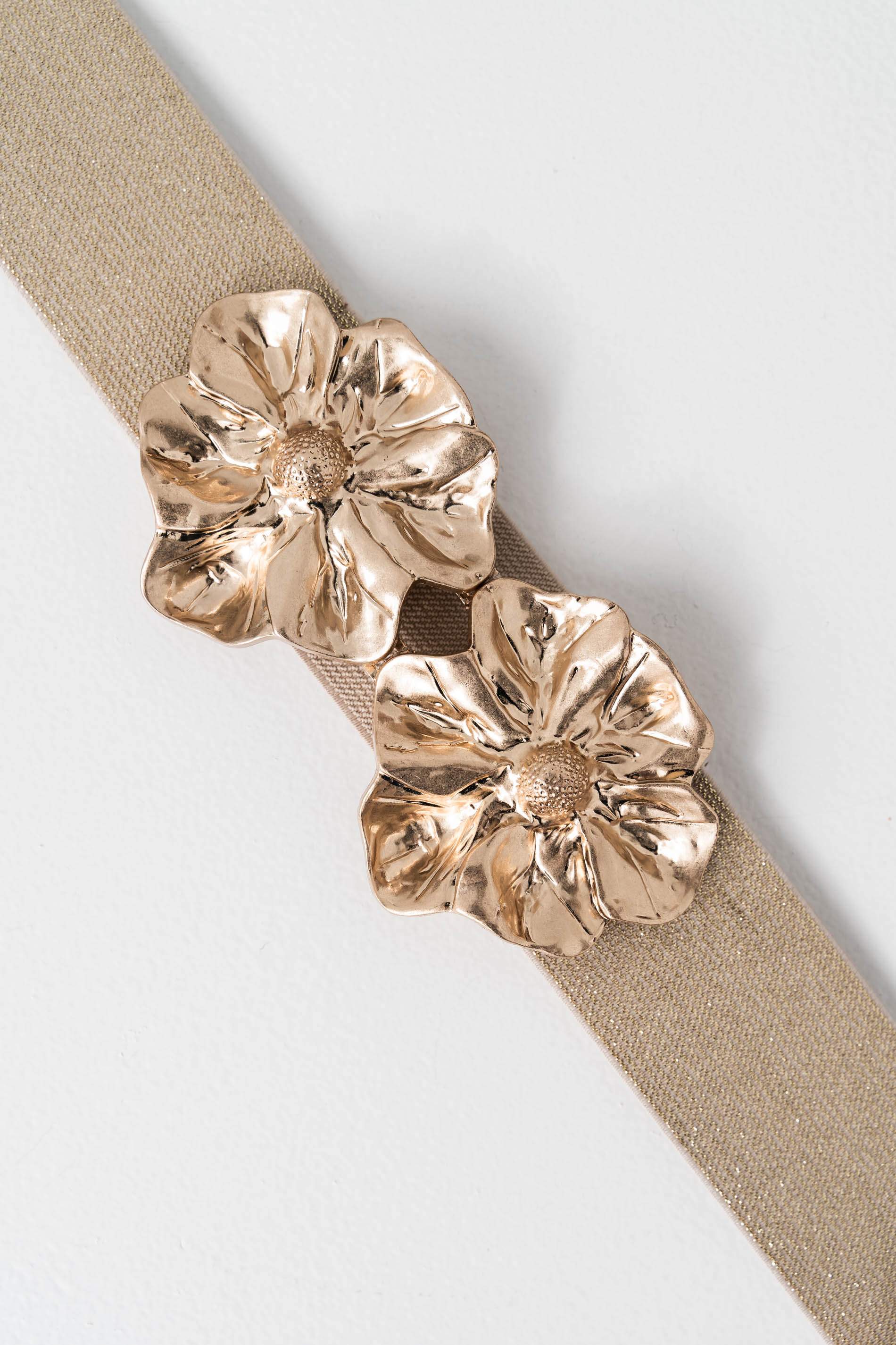 CINTURON ELASTICO FLOR METAL ORO