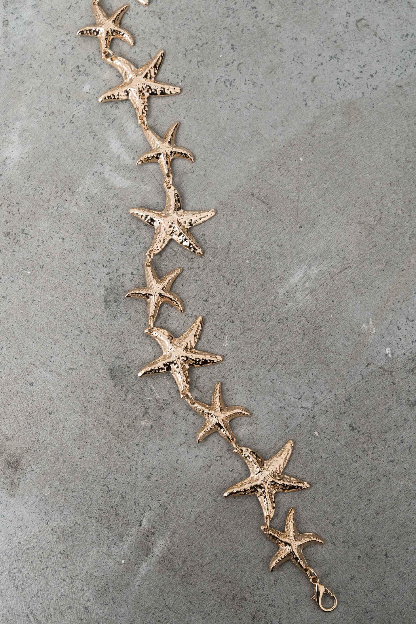 CINTURON CADENA ESTRELLA